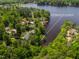 Aerial shot of waterfront property with lake views near 959 Sagamore Dr Louisburg at 959 Sagamore Dr, Louisburg, NC 27549