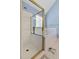 Bathroom featuring walk in shower with glass door, jetted tub and tile floors at 959 Sagamore Dr, Louisburg, NC 27549