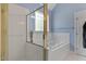 Bathroom featuring walk in shower, jetted tub and tile floors at 959 Sagamore Dr, Louisburg, NC 27549