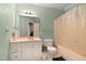 Bathroom with vanity, toilet, and shower/tub combo at 959 Sagamore Dr, Louisburg, NC 27549