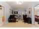 A well lit bedroom featuring themed decor and ample desk space at 959 Sagamore Dr, Louisburg, NC 27549