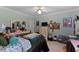 Bright bedroom with an organized desk and ample sunlight at 959 Sagamore Dr, Louisburg, NC 27549
