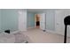 Unfurnished bedroom features three doors, neutral carpet and plenty of space at 959 Sagamore Dr, Louisburg, NC 27549