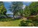 A waterfront home featuring a private dock, boat, and scenic lake views at 959 Sagamore Dr, Louisburg, NC 27549