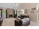 Spacious living room featuring a stone fireplace, vaulted ceiling and plush seating arrangement at 959 Sagamore Dr, Louisburg, NC 27549