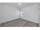 Bedroom with neutral walls, carpet floors and single window at 4868 Pioneer Dr, Sanford, NC 27330