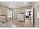 Main bedroom with wood-look floors and open to living room at 4868 Pioneer Dr, Sanford, NC 27330