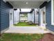 Cozy back patio featuring a concrete surface, lush grass, and access to the outdoors and home at 10 Relaxing Way, Pittsboro, NC 27312