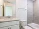 Well-lit bathroom with a vanity, a modern sink, and tiled shower at 10 Relaxing Way, Pittsboro, NC 27312