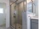 Modern bathroom showcasing a glass-enclosed shower with stylish tile work at 10 Relaxing Way, Pittsboro, NC 27312