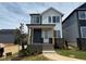 Charming two-story home with brick accents and a welcoming front porch at 10 Relaxing Way, Pittsboro, NC 27312