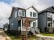 Well-designed two-story home featuring a covered porch, set in a landscaped yard at 10 Relaxing Way, Pittsboro, NC 27312