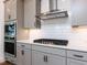 Modern kitchen features stainless steel appliances, gray cabinets, and white subway tile backsplash at 10 Relaxing Way, Pittsboro, NC 27312