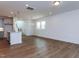 Open-concept floor plan with kitchen island, and staircase at 10 Relaxing Way, Pittsboro, NC 27312