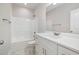 Modern bathroom featuring a white vanity and a shower/tub combo at 1000 Peedin Rd, Selma, NC 27576