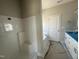 Bathroom featuring a separate shower, bathtub, and white cabinets with modern fixtures at 1000 Peedin Rd, Selma, NC 27576