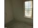 Unfinished bedroom with a window partially covered, ready for customization to your liking at 1000 Peedin Rd, Selma, NC 27576