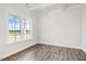Bedroom with a large window and a ceiling with decorative coffers at 1000 Peedin Rd, Selma, NC 27576