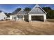 Charming single-Gathering home with an attached garage, complemented by a beautifully designed elevation at 1000 Peedin Rd, Selma, NC 27576