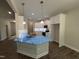Kitchen with white cabinets, stainless steel appliances, and a large kitchen island at 1000 Peedin Rd, Selma, NC 27576