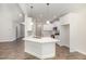 Modern kitchen with white cabinets, quartz countertops, and stainless-steel appliances at 1000 Peedin Rd, Selma, NC 27576