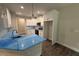 Modern kitchen with white cabinets, stainless steel appliances, and ample counter space for cooking and entertaining at 1000 Peedin Rd, Selma, NC 27576