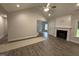 Bright living room featuring hardwood floors, fireplace and open layout, perfect for comfortable living at 1000 Peedin Rd, Selma, NC 27576