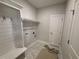 Well-organized mudroom with built-in storage, bench seating, and a convenient coat rack at 1000 Peedin Rd, Selma, NC 27576