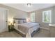 Bedroom showcasing neutral walls, carpeted floors and natural light at 1013 Whitney Springs Ct, Holly Springs, NC 27540