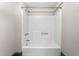 Full bathtub with white walls at 104 E Wilson St, Mebane, NC 27302