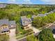 Birds-eye view of the property, highlighting landscaping and an enclosed back porch at 1093 Trentini Ave, Wake Forest, NC 27587