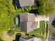 Aerial view of the property featuring the roof, backyard with playset, and landscaping at 1093 Trentini Ave, Wake Forest, NC 27587