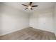 Neutral bedroom with a ceiling fan and ample closet space at 1093 Trentini Ave, Wake Forest, NC 27587