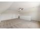Huge bonus room with neutral carpet and high angled ceilings, perfect for many uses at 1093 Trentini Ave, Wake Forest, NC 27587