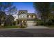 Charming two-story home boasts a welcoming front porch and well-manicured landscaping at 1093 Trentini Ave, Wake Forest, NC 27587
