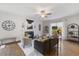 Cozy living room features fireplace, ceiling fan, and recessed lighting at 1093 Trentini Ave, Wake Forest, NC 27587