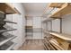 Large closet featuring custom organizers, shelving, drawers, and hanging space for optimal storage at 1093 Trentini Ave, Wake Forest, NC 27587