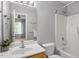 Well-lit bathroom featuring a soaking tub, shower, vanity, and updated fixtures at 11210 Lofty Heights Pl, Raleigh, NC 27614