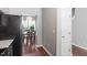 Inviting dining room with hardwood floors, a modern pendant light, and a view of the backyard at 11210 Lofty Heights Pl, Raleigh, NC 27614