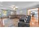 Open living room area featuring hardwood floors, a fireplace, and lots of natural light at 1140 Buttercup Ln, Wake Forest, NC 27587