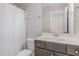 Bathroom featuring a single sink vanity with dark wood cabinets at 12 Douglas Fir Pl, Clayton, NC 27520