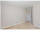 Bedroom featuring a neutral carpet, light walls, and an open doorway at 12 Douglas Fir Pl, Clayton, NC 27520