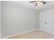 Cozy bedroom featuring a ceiling fan and a double door closet at 12 Douglas Fir Pl, Clayton, NC 27520