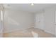 Well-lit bedroom features a double door closet and neutral carpet at 12 Douglas Fir Pl, Clayton, NC 27520