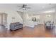 Open-concept living room flowing into the kitchen and dining area with hardwood flooring at 12 Douglas Fir Pl, Clayton, NC 27520