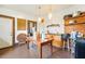 Rustic kitchen design featuring vintage light fixtures and raw wood accents at 1207 Wall St, Durham, NC 27701