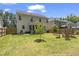 Beautiful backyard with a green lawn and outdoor seating, perfect for relaxation at 126 Elmsford St, Durham, NC 27703