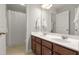 This full bathroom features double sinks and shower/tub combination at 126 Elmsford St, Durham, NC 27703
