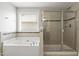 This bathroom includes a separate tub and shower at 126 Elmsford St, Durham, NC 27703