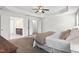 This main bedroom includes double doors to the bathroom and walk-in closet at 126 Elmsford St, Durham, NC 27703